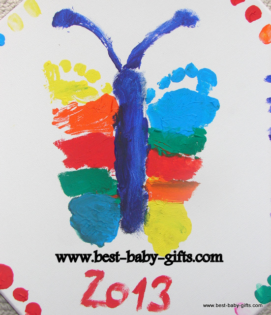 colorful butterfly made of baby feet prints