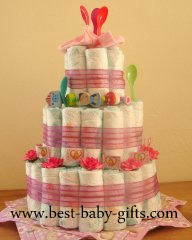 large diaper cake decorated with lots of of flowers