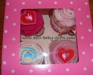 rolled up socks displayed in a cupcake box