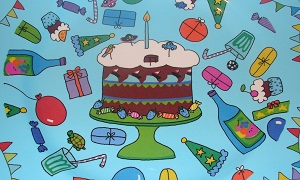 colorful painted cake with a first birthday candle