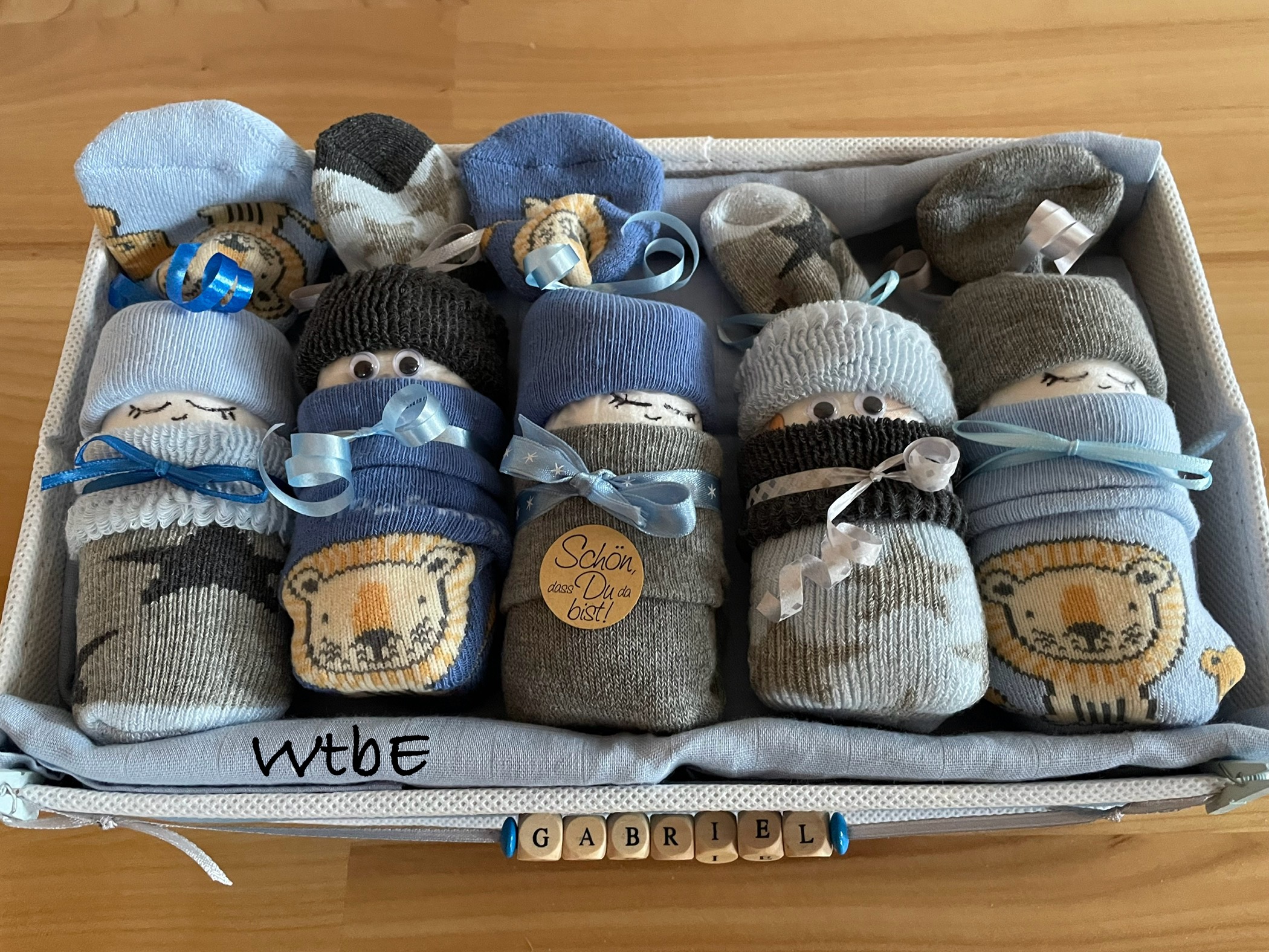 boy sock diaper babies in a basket