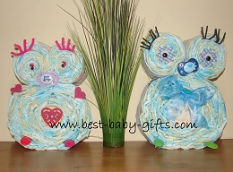 2 DIY diaper owls side by side, one in pink and one in blue