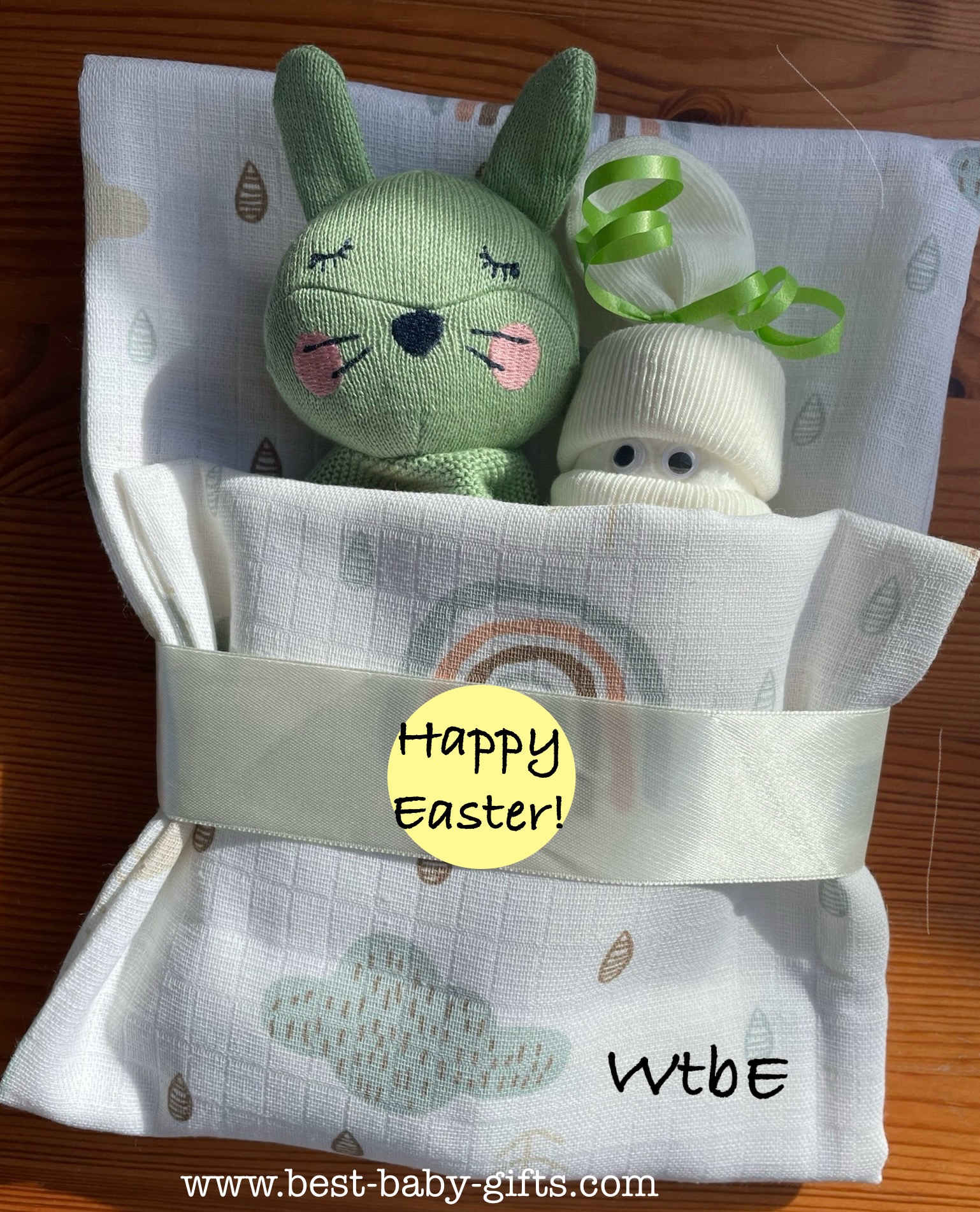 neutral easter baby gift idea, a diaper baby and a bunny in a burp cloth, homemade