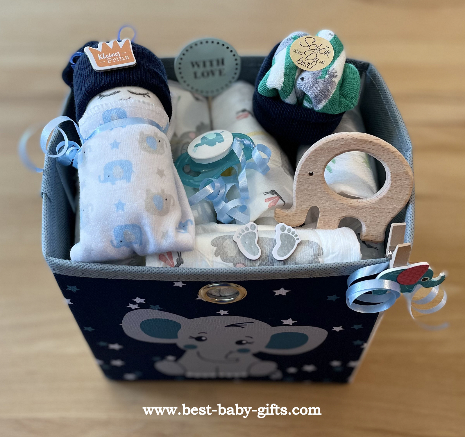 elephant storage box filled with various baby items with an elephant design