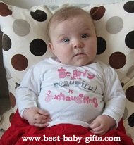 a baby girl looking quite groggy wearing a shirt saying: being beautiful is exhausting!