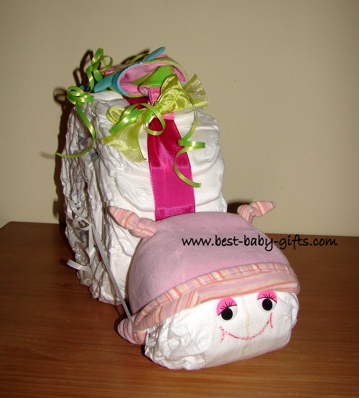a girl diaper snail wearing a pink hat with integrated feelers