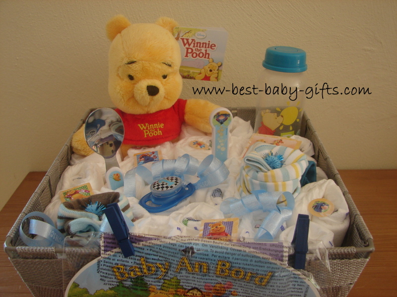 close-up of the boxed diaper cake featuring the plush Winnie toy