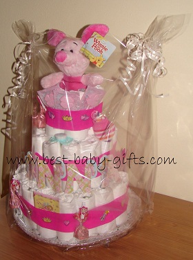 large all in pink diaper cake with a plus Piglet on top